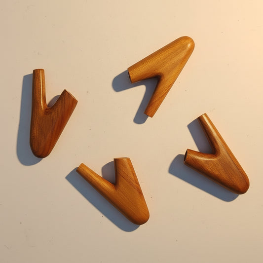 Four brown arrow-shaped objects on a white background